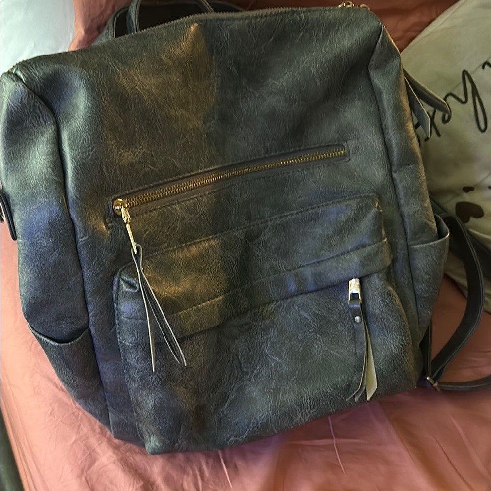 Stylish Gray Leather Backpack